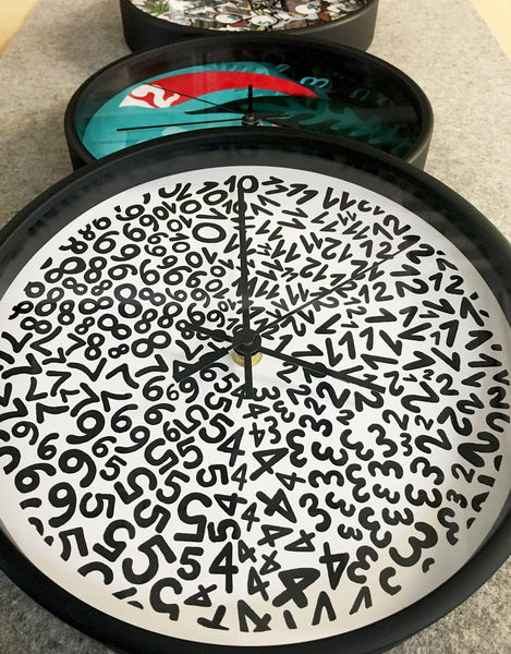 Time Flies When You're Doodling! New Wall Clocks with Doodlers Anonymous.